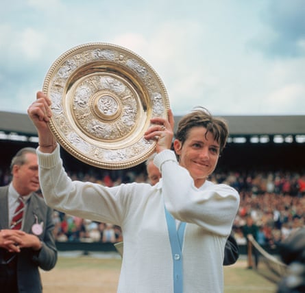 Court with the Wimbledon singles trophy in 1970.