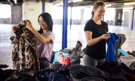 Volunteers from the Care4Calais charity sort through donations at a warehouse in Stockport, Greater Manchester