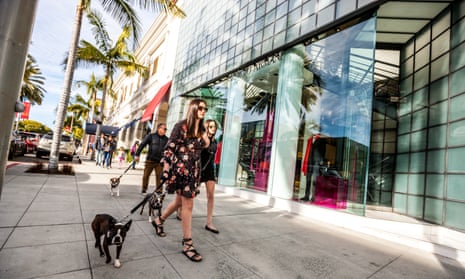 Shoppers walking dogs on Rodeo Drive, Beverly Hills, US