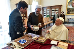 Vatican CityPope Francis is shown a gift as he receives Ayatollah Alireza Arafi, president of Islamic Seminaries of Iran, and entourage in a private audience