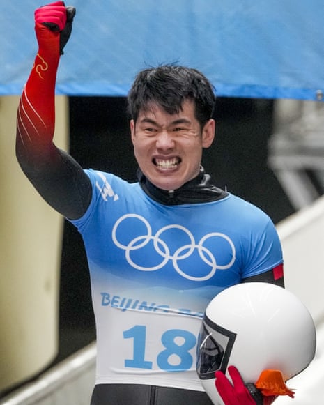 China’s Yan Wengang celebrates after his run.