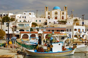 Fishing boats and blue-domed church, Greek Orthodox, Isle of Lipsi, Dodecanese.