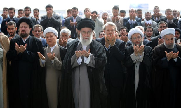 Iranian supreme leader Ayatollah Ali Khamenei (centre) leading the Eid al-Fitr prayers with former president Hashemi Rafsanjani on his right.