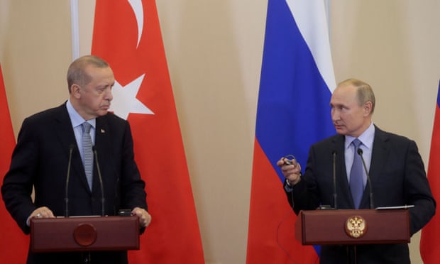 President Recep Tayyip Erdoğan of Turkey, left, with the Russian president, Vladimir Putin, at a joint news conference following talks in Sochi, Russia, in October