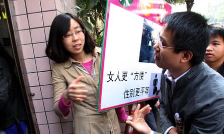 A Chinese student occupies a men’s toilet to protest for more cubicles for women, 2012.