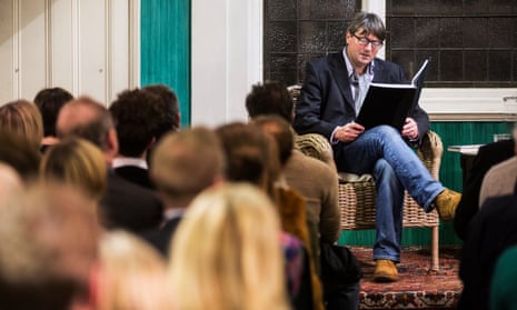 Poet laureate Simon Armitage reads to an audience