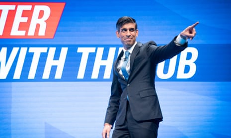 Chancellor of the Exchequer, Rishi Sunak arrives on stage to deliver his keynote speech to the Conservative Party Conference