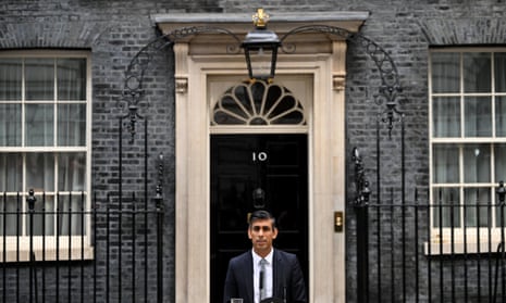 A picture of British Prime Minister Rishi Sunak makes a statement after taking office outside Number 10 in Downing Street.