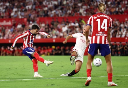 Álex Baena scores Atlético Madrid’s third goal at Sevilla.