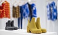Boots and other items on display in a Burberry Group store in London