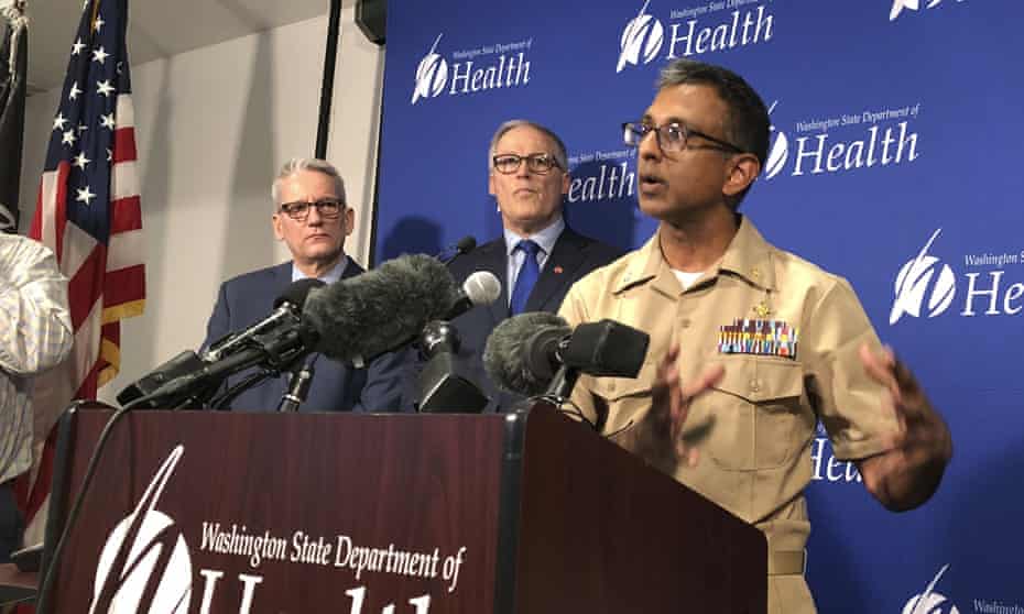 Satish Pillai, right, a medical officer for the CDC, speaks on Tuesday following the announcement of the first known person in the US with the new coronavirus strain.