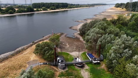 Aerial view of three former vessels standing on dry land, including a sailing ship and an eel-fishing boat, connected by a bridge and now serving as a cafe at the old confluence of the Wupper and the Rhine