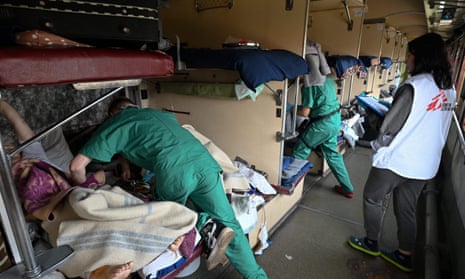 An MSF team care for patients on a medical evacuation train on its way to the western Ukrainian city of Lviv on 10 April.
