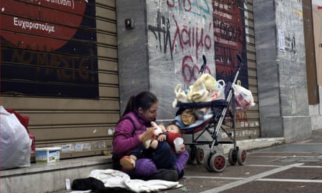 A mother with her baby begging in Athens. The youth unemployment rate has reached 51% in Greece, compared with 16% in the UK.