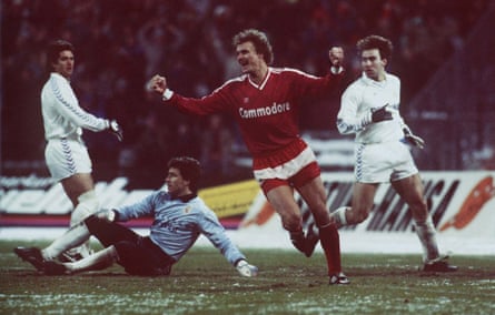 Roland Wohlfarth with his arms in the arm after scoring