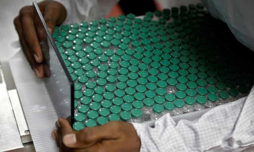 A clinician with vials of AstraZeneca’s Covid vaccine in Pune, India.
