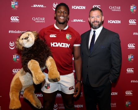 Maro Itoje carries the Lions mascot adjacent to Andy Farrell