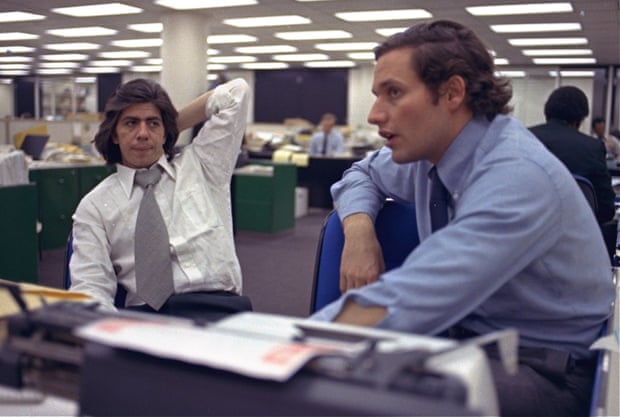 Reporters Bob Woodward, right, and Carl Bernstein, whose reporting of the Watergate case won them a Pulitzer Prize, sit in the newsroom of the Washington Post in Washington 1973.