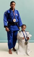 Nekoda Smythe-Davis with her daughter Ryia, two. Smythe-Davis is dressed in her judo outfit