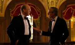 This image released by Netflix shows Michael Keaton, left, and Stanley Tucci in a scene from “Worth.” (Netflix via AP)