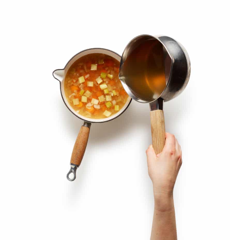 Felicity Cloake’s minestrone – adding stock.