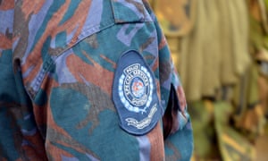 A police officer stands guard in Papua New Guinea