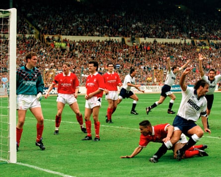 Tottenham players celebrate after Des Walker (on floor) heads the ball into his own net during the 1991 FA Cup final.