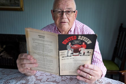 Tony Riley leafs through an old programme.