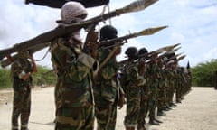 File photo of al-Shabaab militants parading new recruits.