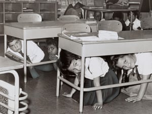 A ‘duck and cover’ nuclear survival drill in a school in New York in 1962.