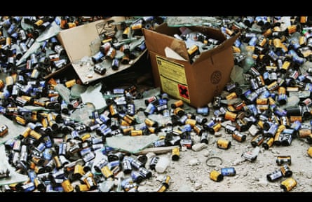 Boxes of and piles of camera film in a still from Do You Love Me.