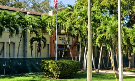 school surrounded by palm trees