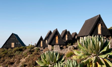 Scandinavian-style wooden huts on the Marangu Route of Kilimanjaro.