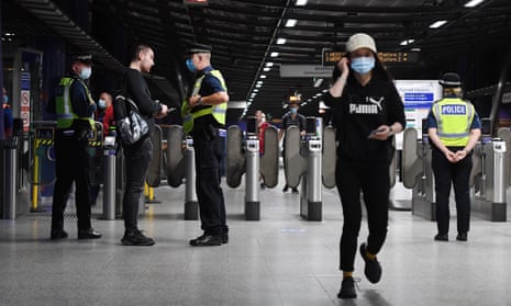 Anti-terror police on patrol at a station in central London.