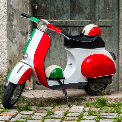 Parked Vespa in Rome, painted in Italian flag colours