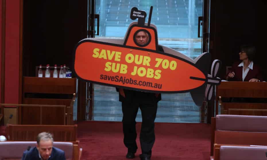 Patrick enters the Senate in a submarine costume