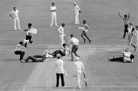 Pro-Tamil demonstrators invade the pitch and hold a sit-down protest