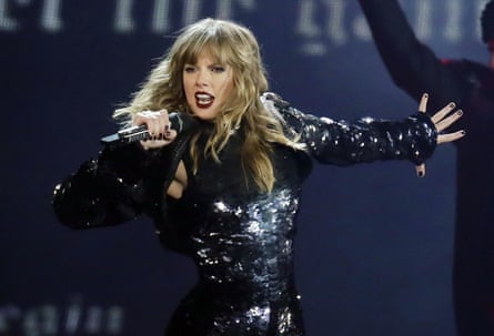 Taylor Swift performing in 2018, during her Reputation album era.