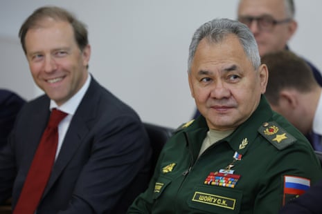 Russian minister of industry and trade Denis Manturov (L) and defence minister Sergei Shoigu (R) at the Vostochny cosmodrome.