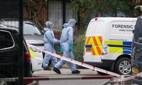 Metropolitan Police forensic officers at crime scene near synagogue