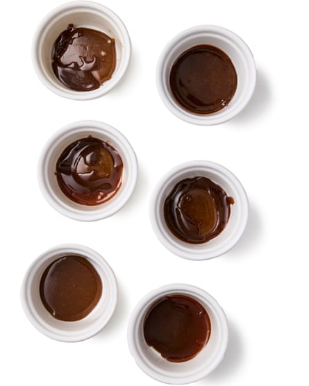 Ramekins filled with dark caramel