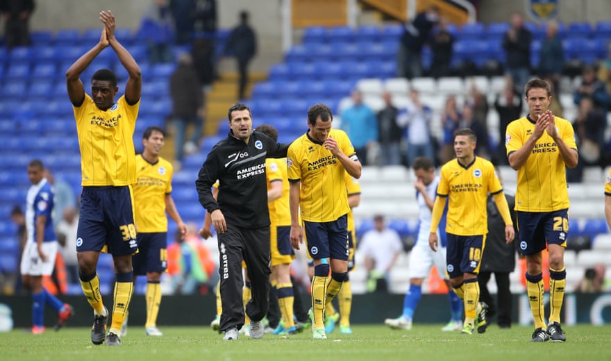 Óscar García and his Brighton players celebrate a victory over Birmingham in August 2013.