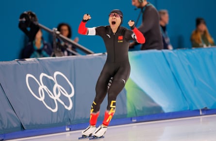 Zhongyan Ning raises his fists after winning gold in the men’s speed skating 1500m final at the 2026 Winter Olympics