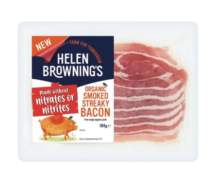 A packet of Helen Browning’s Organic Smoked Streaky Bacon without Nitrates. The packet is entirely clear except for the label on the left hand side.