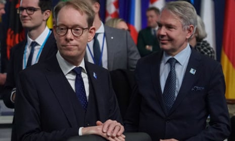 Finland’s foreign minister, Pekka Haavisto, with his Swedish counterpart, Tobias Billström, at a Nato meeting on 29 November in Bucharest.