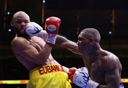 Conor Benn lands a blow on Chris Eubank Jr at Tottenham Hotspur Stadium.