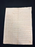 An old piece of paper covered in flamboyant faded handwriting, mainly from right to left but with part of the letter written vertically in the margin