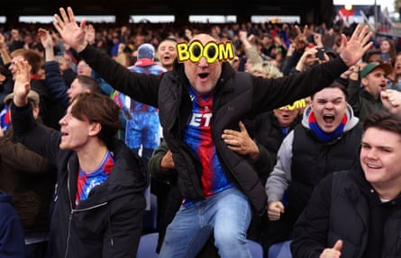 A Crystal Palace fan with a ‘Boom’ pair of glasses.