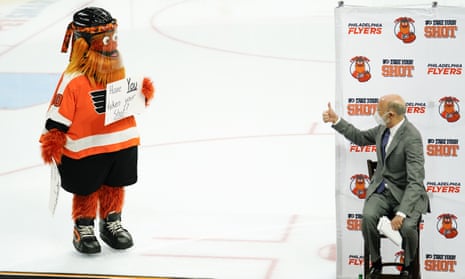Governor Tom Wolf gives the thumbs up to Philadelphia Flyers’ mascot, Gritty, during a news conference encouraging people to get the Covid-19 vaccine, in Philadelphia in the US.