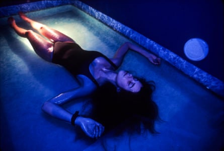A woman floats in a flotation tank
